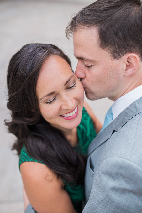 romantic kiss on the cheek engagement photo at Legion of Honor