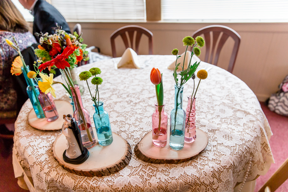 rainbow themed wedding ceterpiece with a touch of vintage