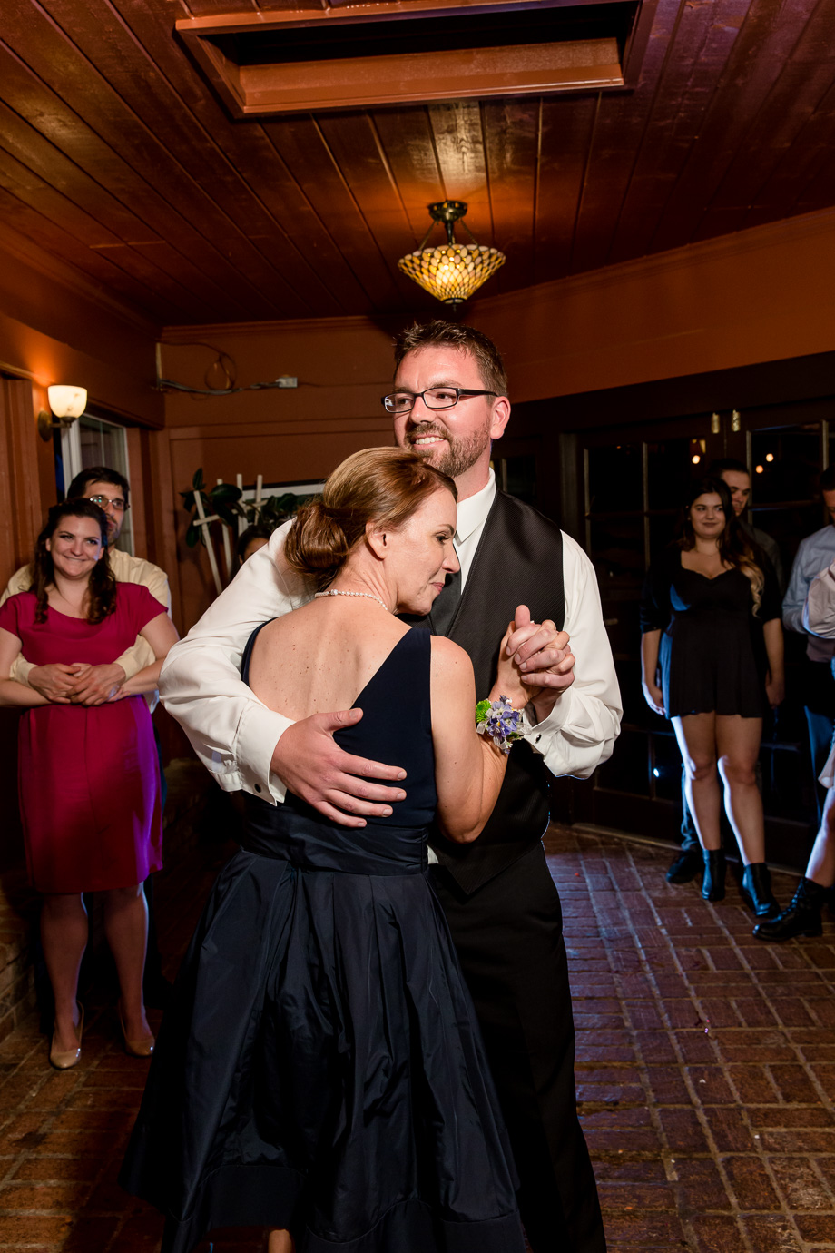 groom dancing with his mother at Mama Mia's Restaurant in Morgan Hill