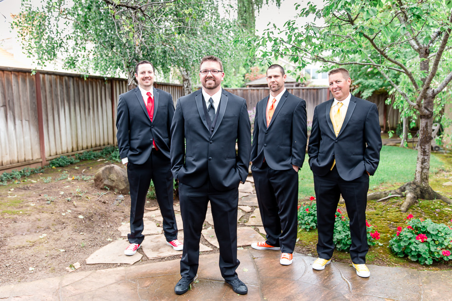 groom and his groomsmen wearing colorful Converses