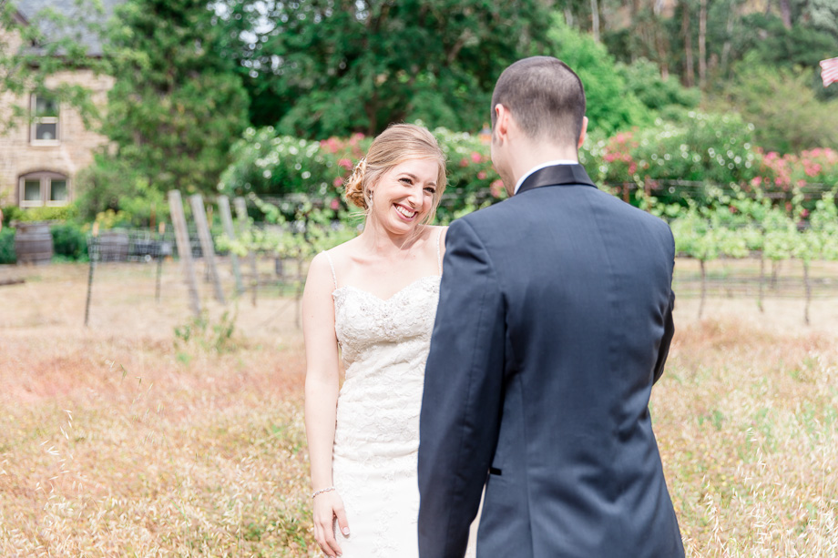 bride sees groom for the first time on their wedding day
