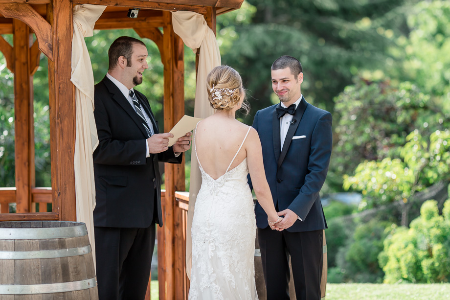 wedding ceremony groom looking at bride