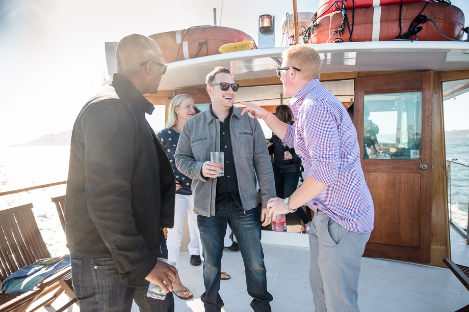 celebrating with friends after the San Francisco private boat proposal