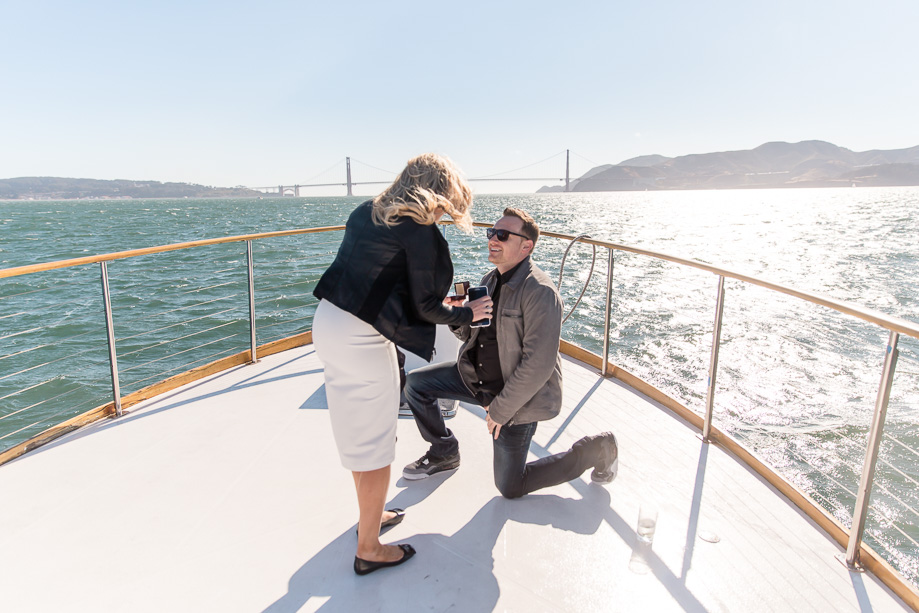 surprise proposal ideas - charter yacht proposal in front of golden gate bridge