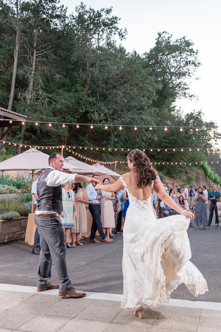 twirl under the string lights