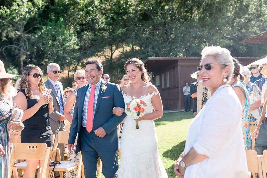 bride was escorted by her dad down the aisle