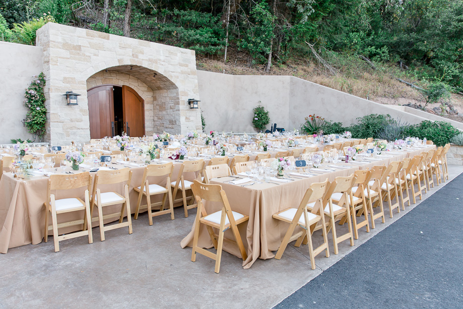 elegant outdoor wedding reception setup at a private estate and winery