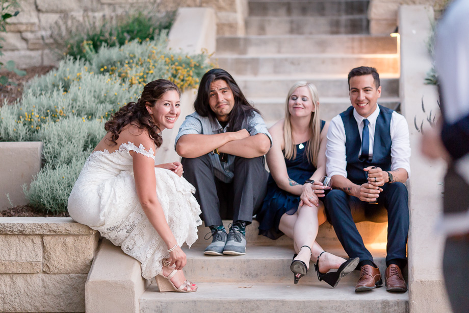 bride watching her groom dancing with his mother