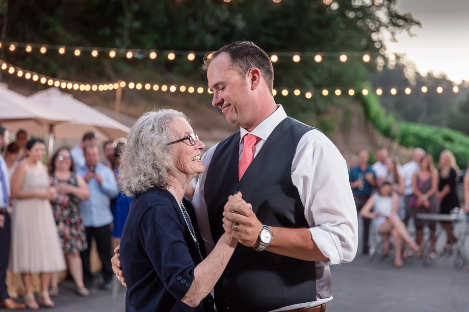 mother and the groom dancing