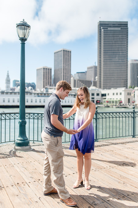 post proposal moment - checking out the engagement ring