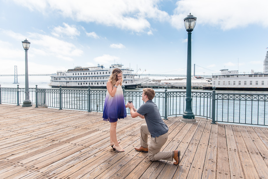 sunny san francisco pier 7 surprise engagement bay bridge background