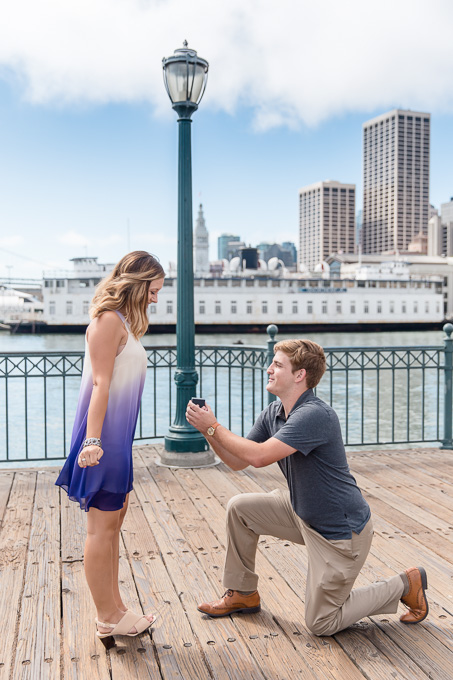 san francisco surprise engagement pier 7 skyline background