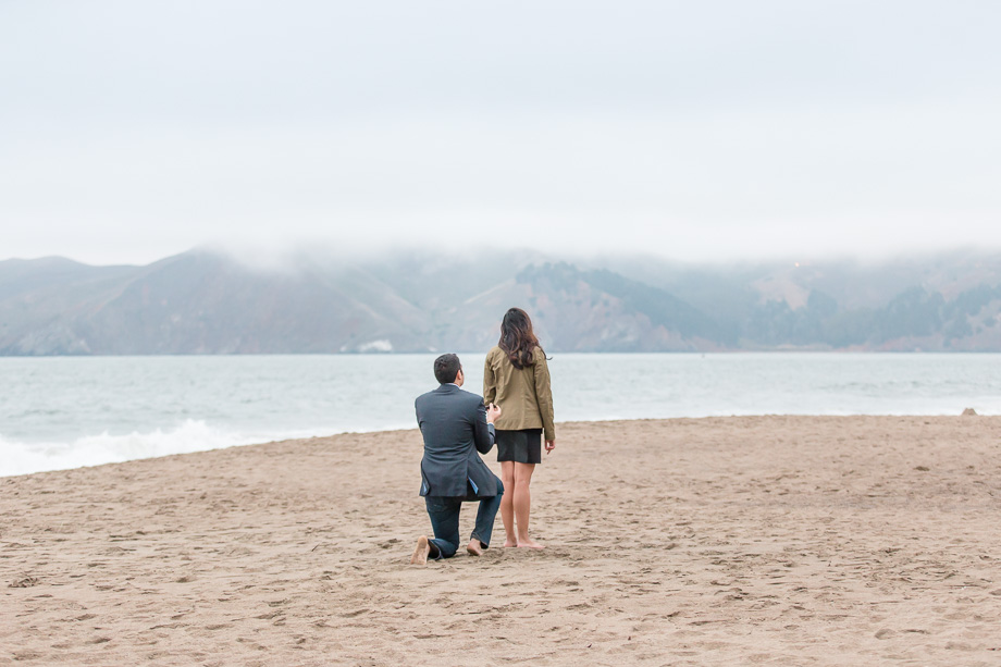 he got down on one knee waiting for her to turn around