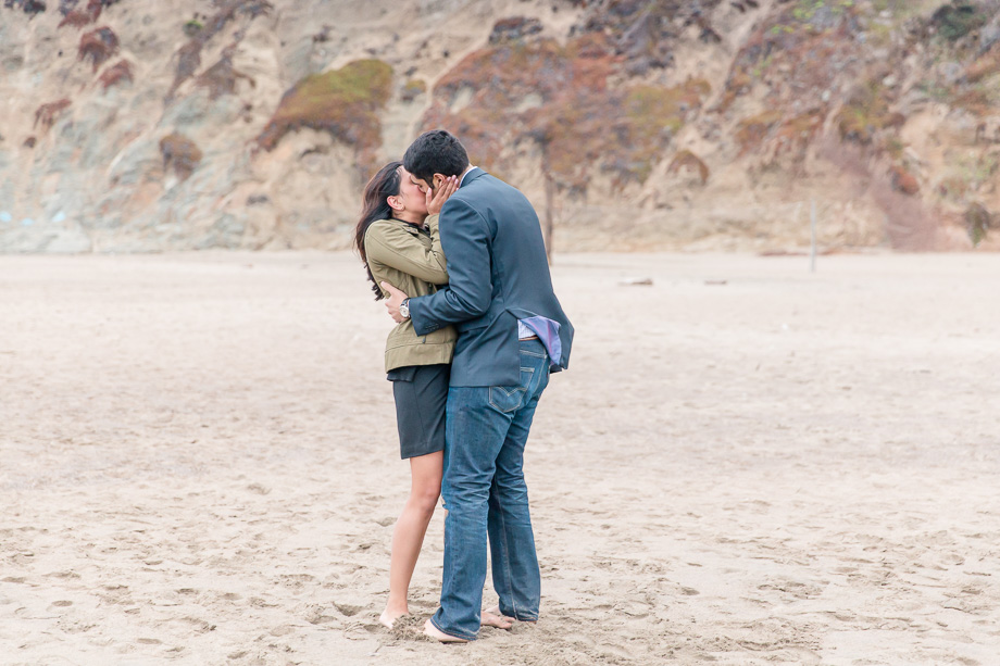 a sweet kiss immediately after the surprise proposal