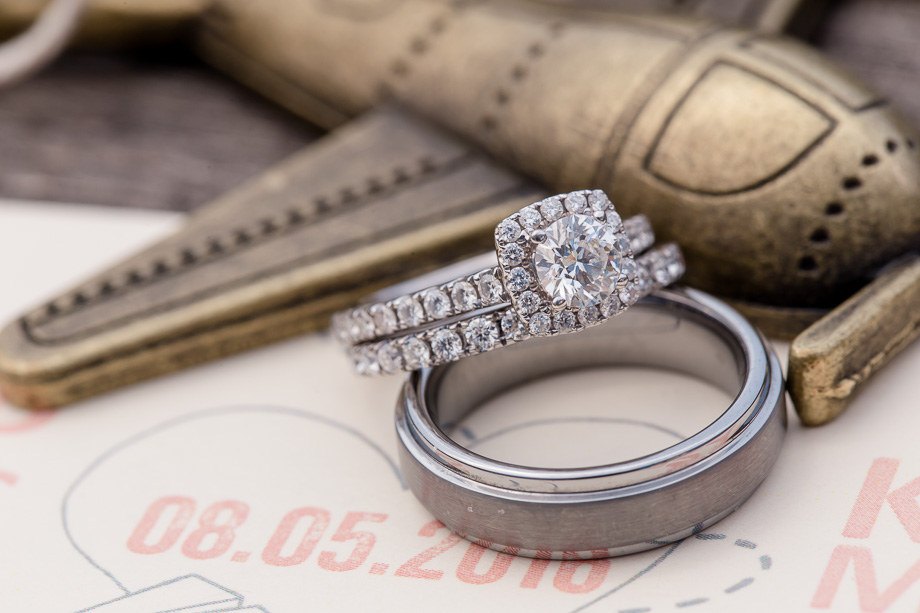 close up shot of the ring set - travel themed wedding
