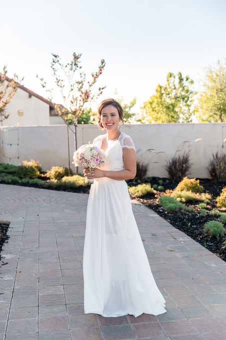 beautiful glowing bride right after the wedding ceremony