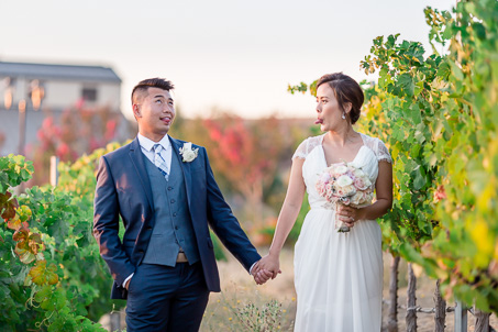 funny picture of the bride and groom making silly faces