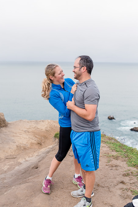newly engagaed couple celebrating their touching moment