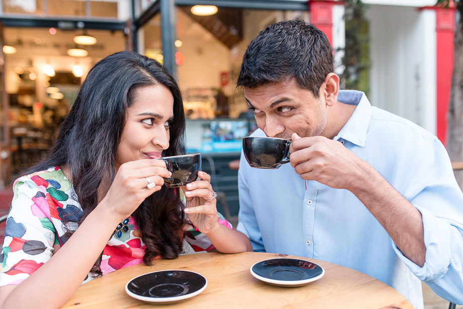 San Francisco urban colorful engagement photo at a local coffee shop