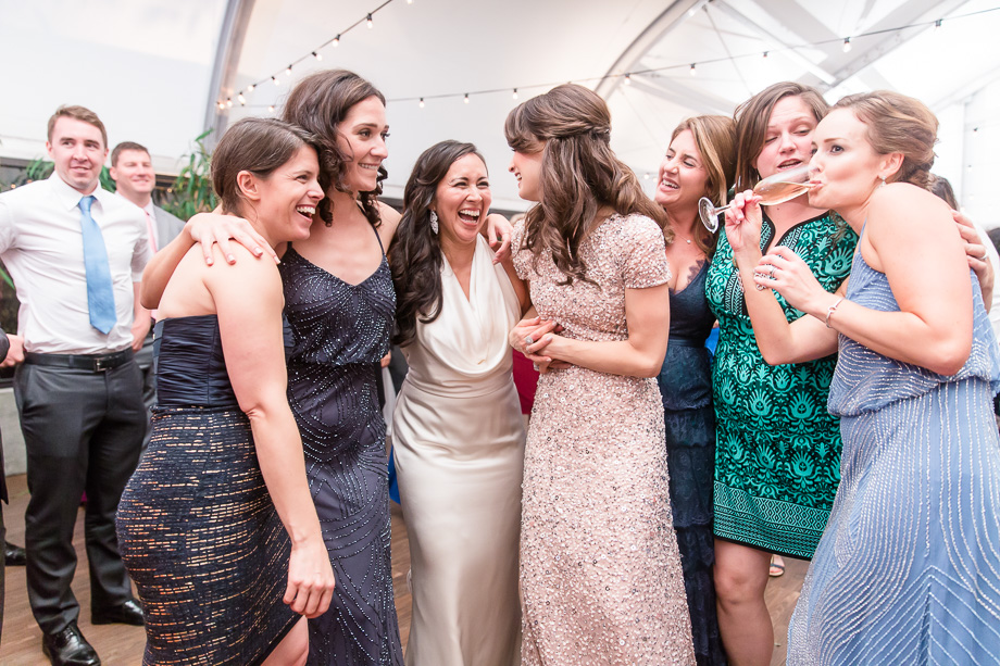 bride with her besties on the dance floor