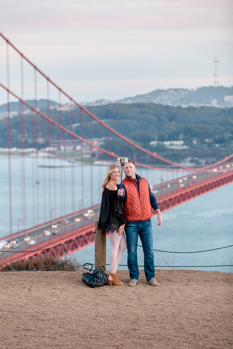 couple taking a selfie right before the surprise proposal