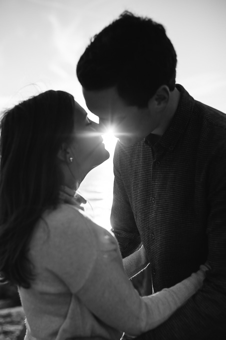 black and white sunflare couple photo