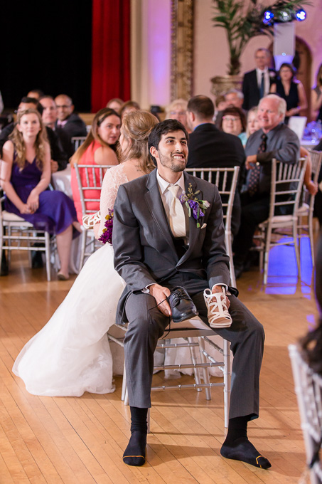 grooms precious facial expression when thinking hard for the funny shoe game