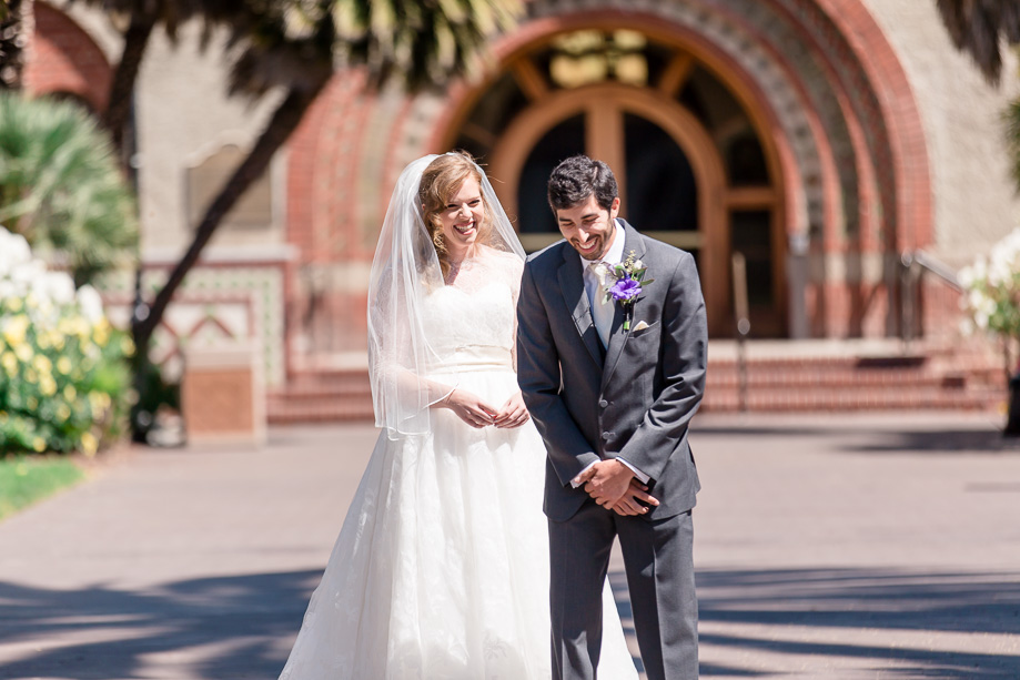 first look giggling right before he turns around to see his bride