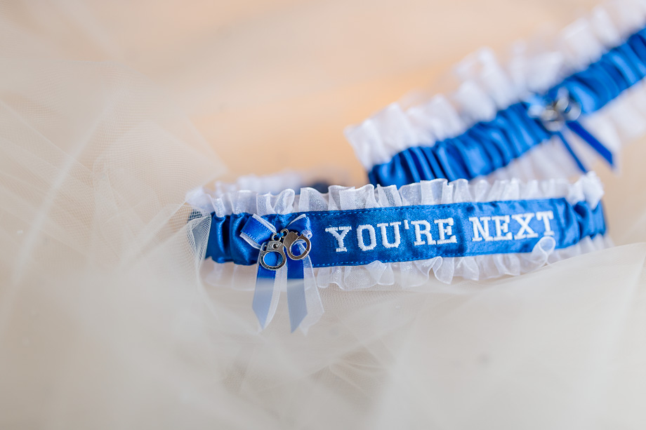 funny wedding garter belt with tiny handcuffs