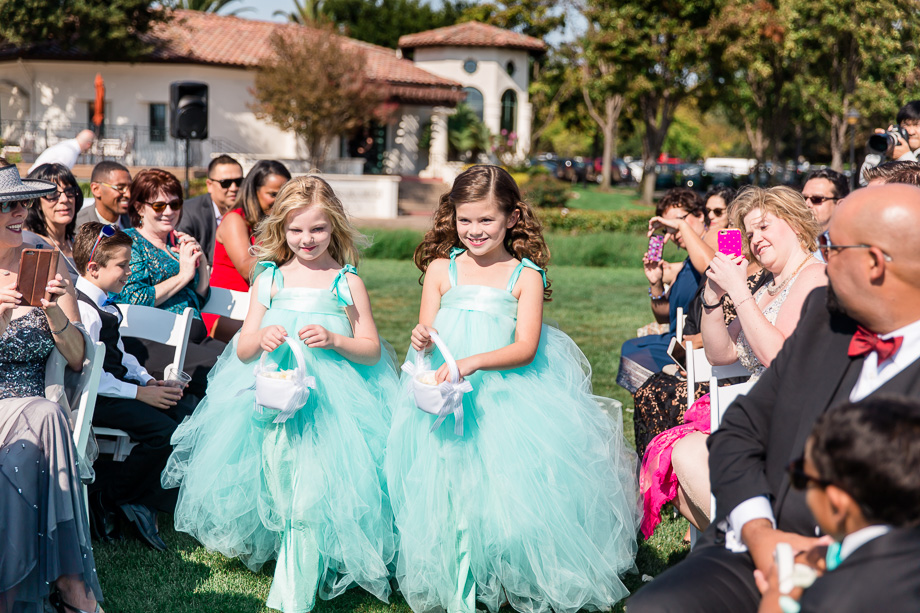 flower girls walking down the aisle