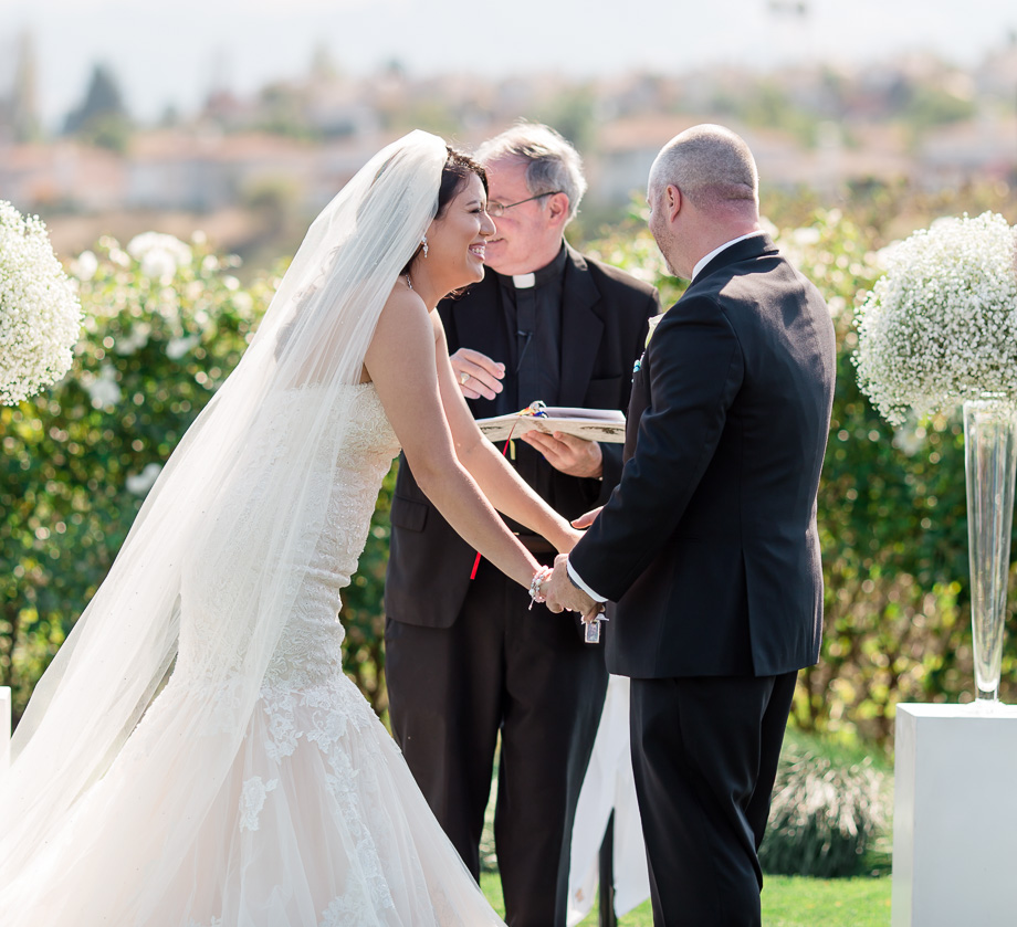 happy bride and groom about to tie the knot