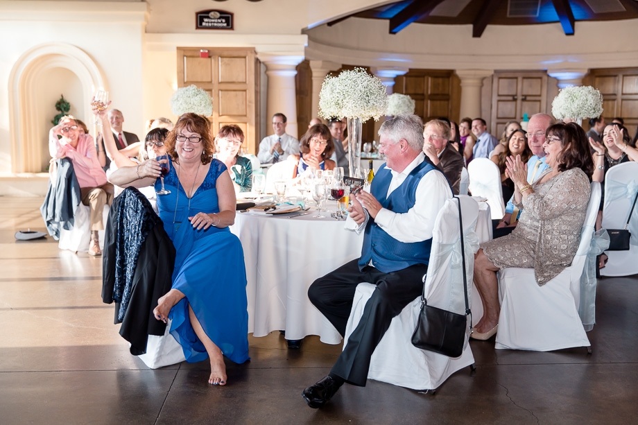 guests enjoying the wedding toasts