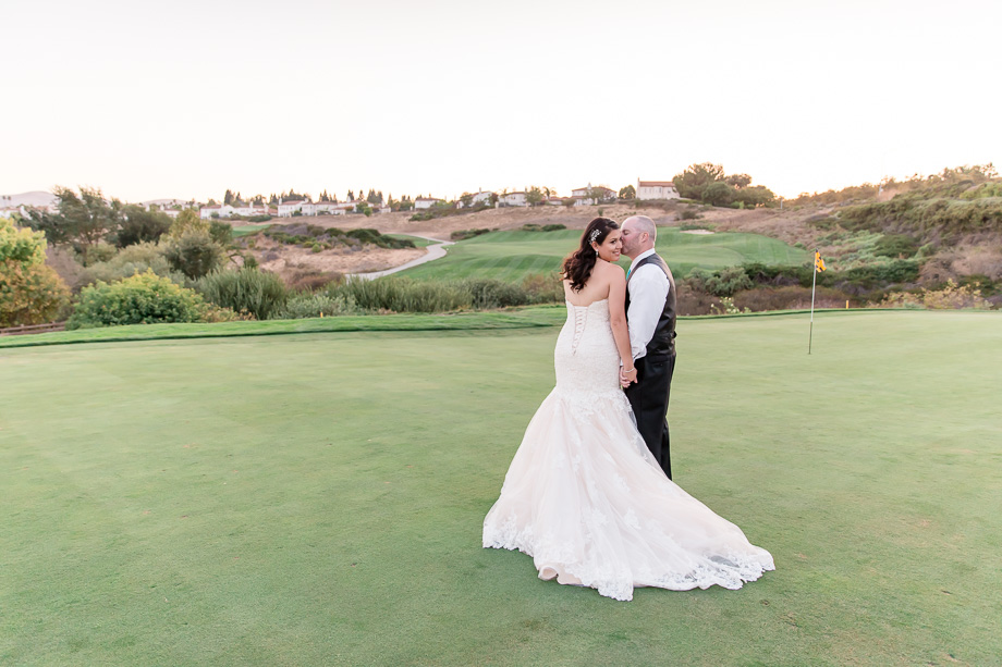 wedding portrait at sunset on a golf course