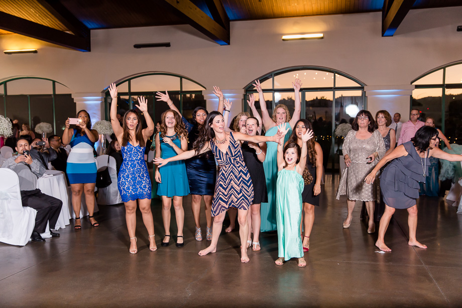 single ladies waiting for the bouquet to be tossed