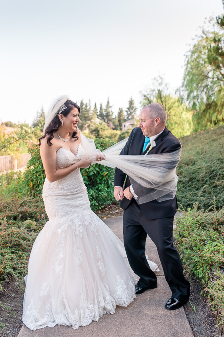 a funny portrait of the bride and groom