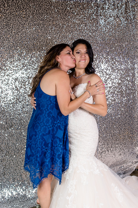 bride and guest inside the photobooth