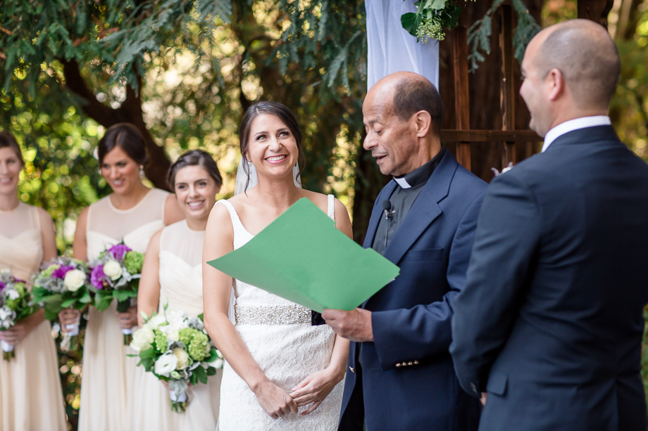 happy couple smiling at officiants marriage advices