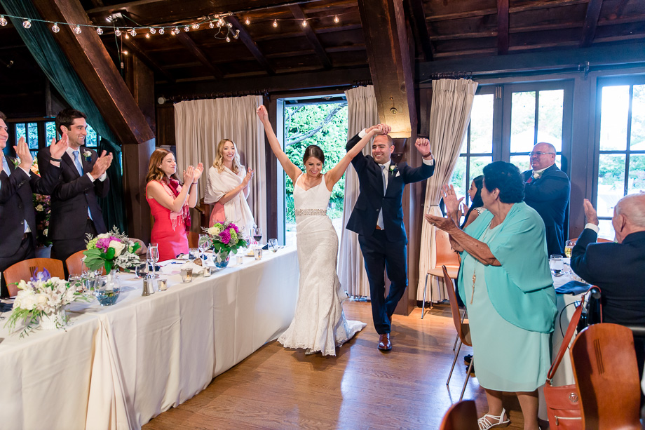 newlywed grand entrance as husband and wife into their reception
