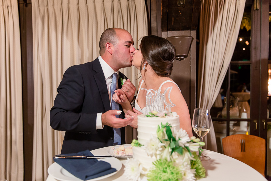 feeding each other wedding cake