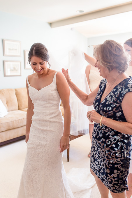 happy moment between mom and the bride while getting ready
