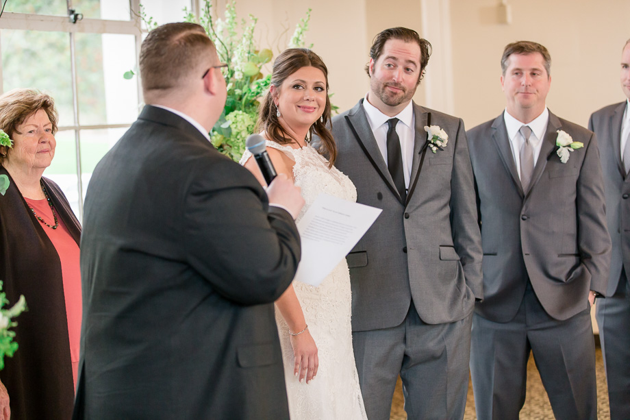 honorary guest blessing the couple at their wedding ceremony