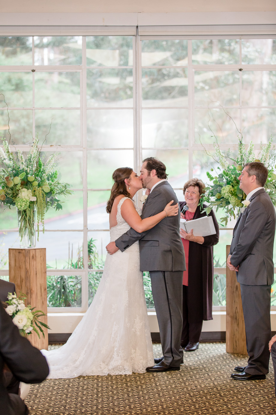 first kiss in front of the big windows at the Golden Gate Club