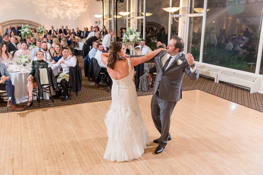 wedding guests enjoying the couples first dance