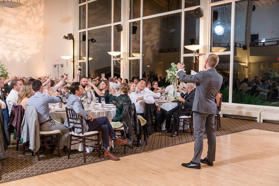 bridal party toasting fot the newlyweds