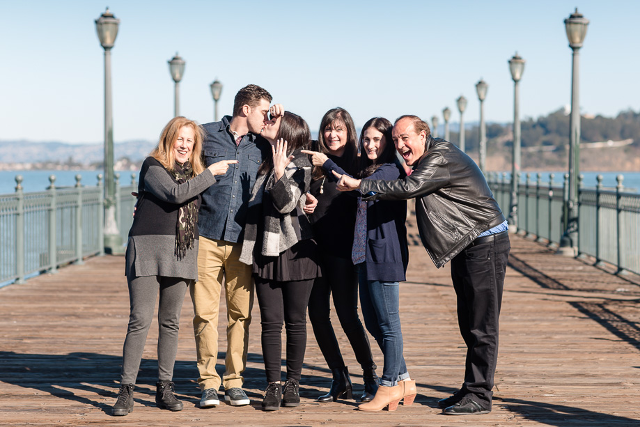 both families flew in from out of town to surprise the newly engaged couple