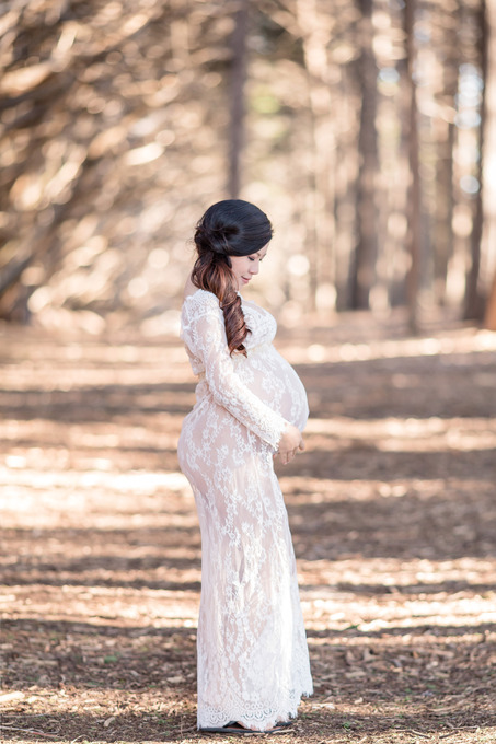 maternity photo with magical cypress trees