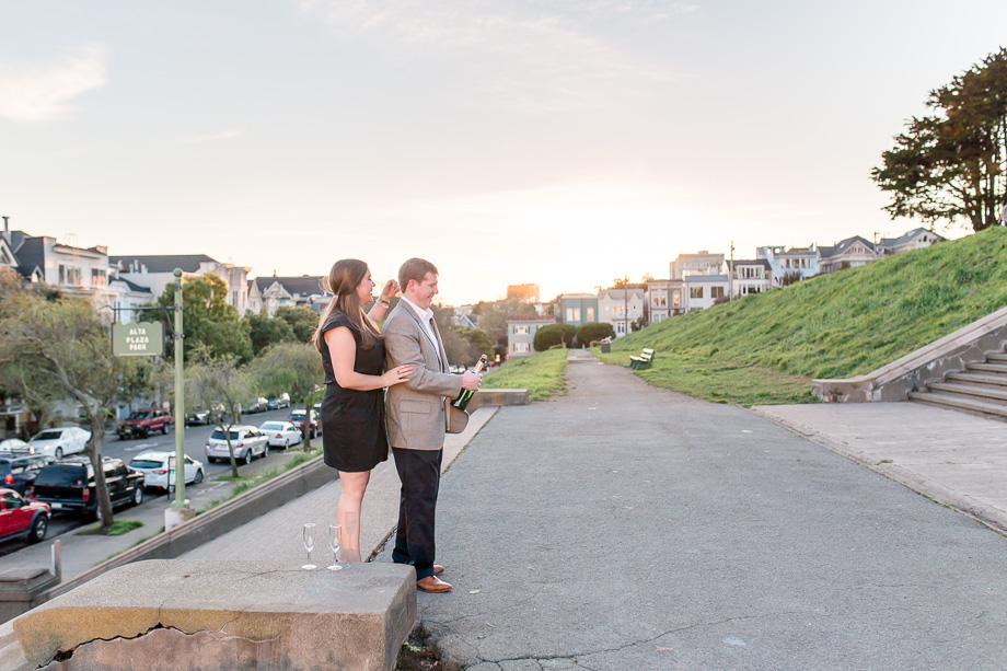 about to celebrate engagement with champagne