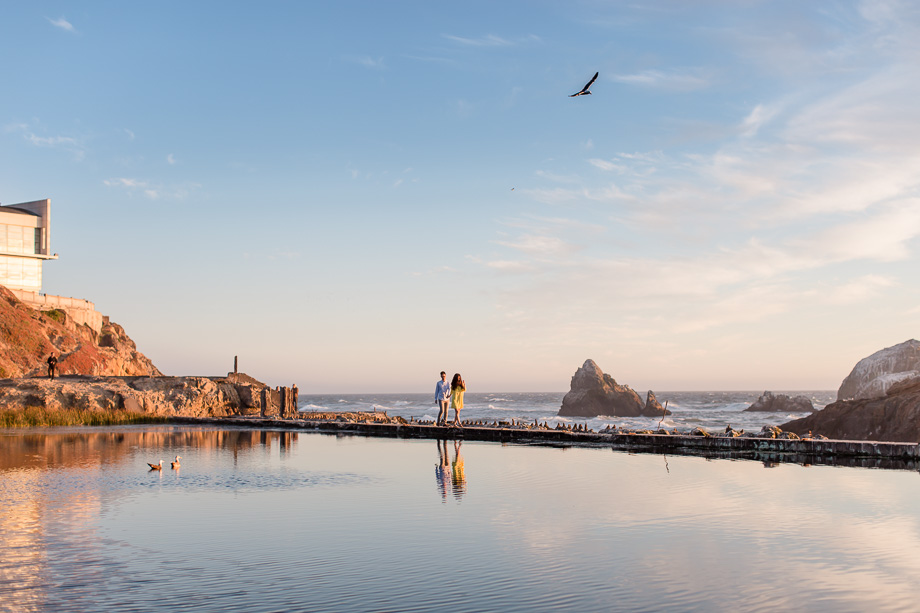 lands end sutro baths engagement couple portrait walking along water