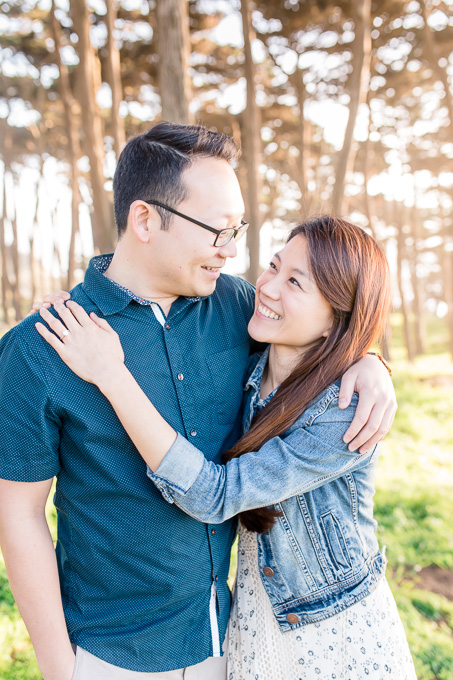 cute engagement photo by cypress trees at lands end