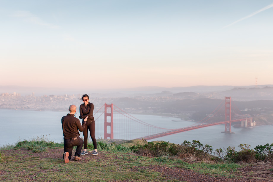 golden gate bridge surprise engagement proposal during sunset